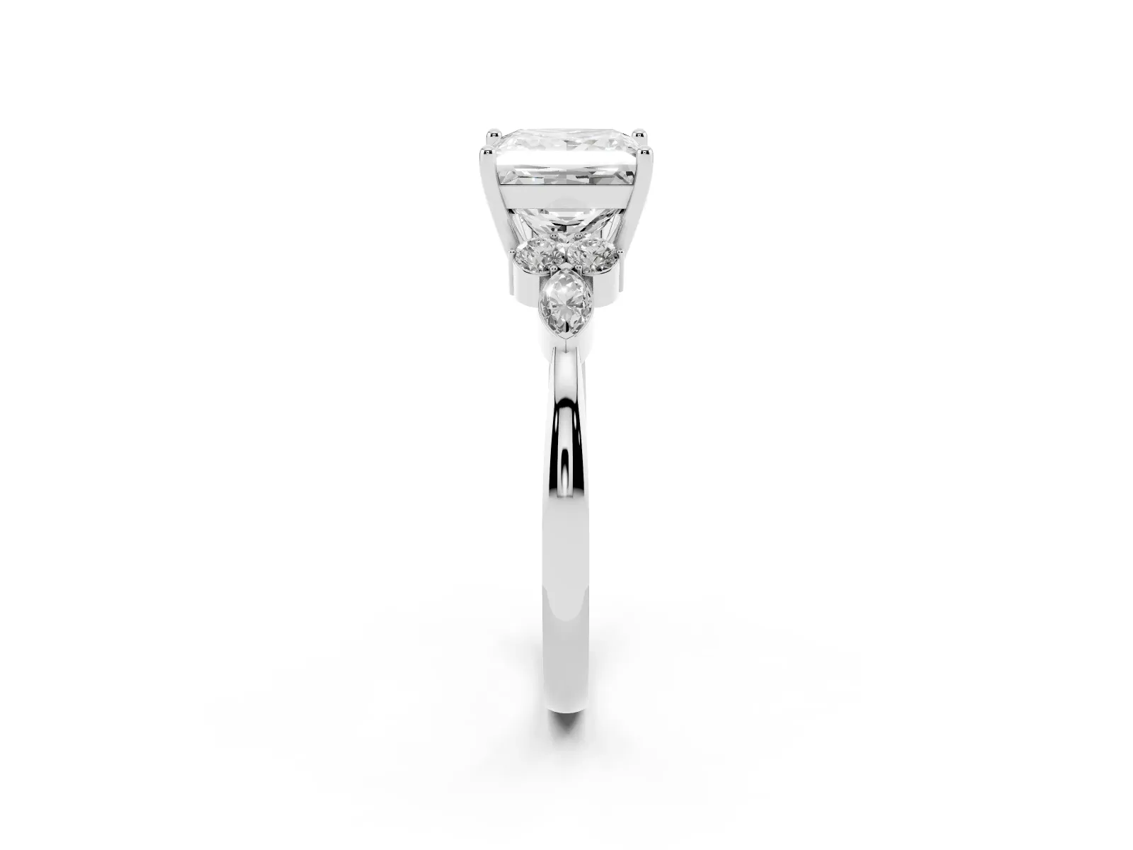 Princess Cut Brilliant Diamond Solitaire Ring with Pear Side Stones and Four-Prong Setting Platinum
