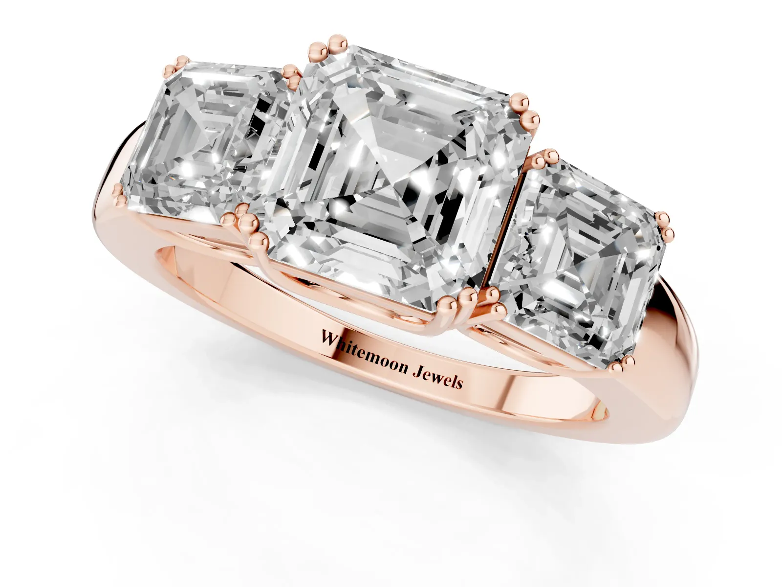 Three-Stone Asscher Cut Cut Diamond Ring with Channel Set Band and Four-Prong Setting Rose gold