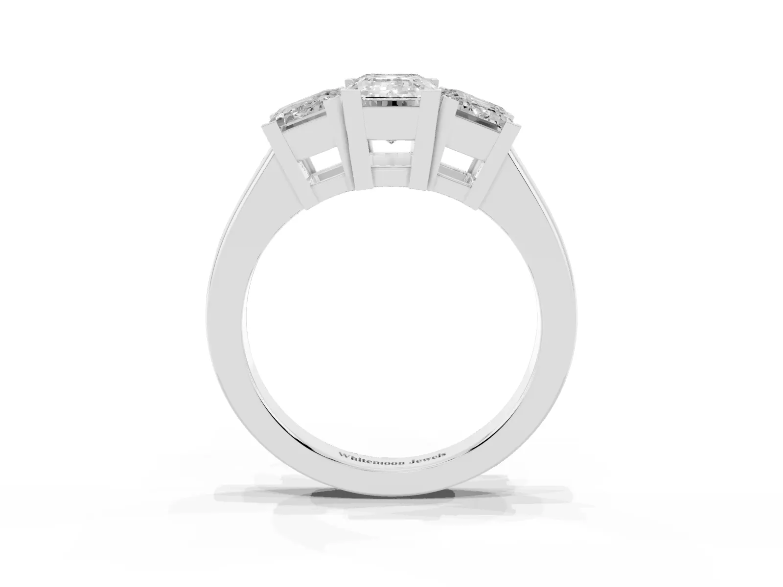 Three-Stone Emerald Cut Cut Diamond Ring with Channel Set Band and Four-Prong Setting Platinum