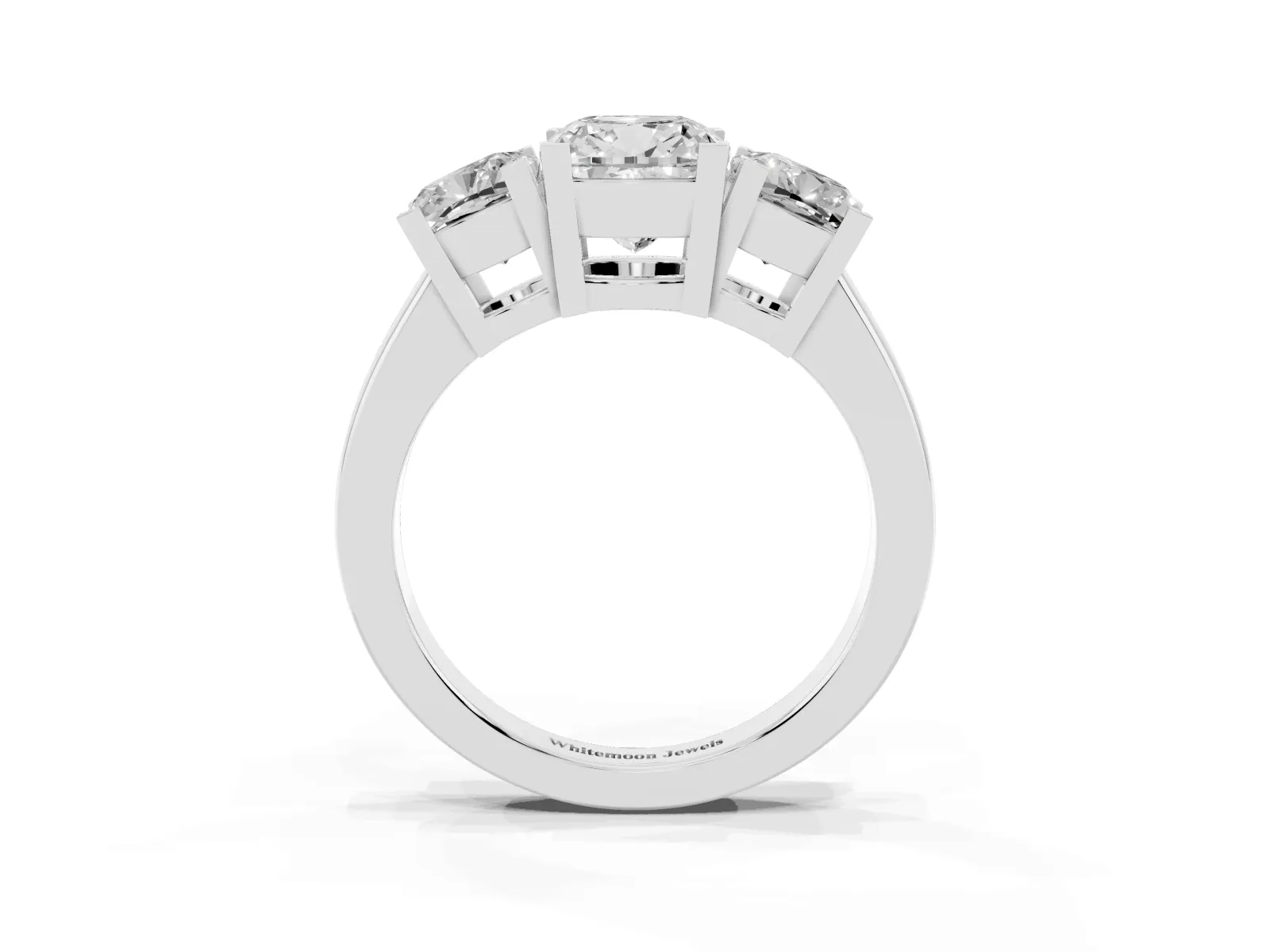 Three-Stone Cushion Cut Cut Diamond Ring with Channel Set Band and Four-Prong Setting Platinum