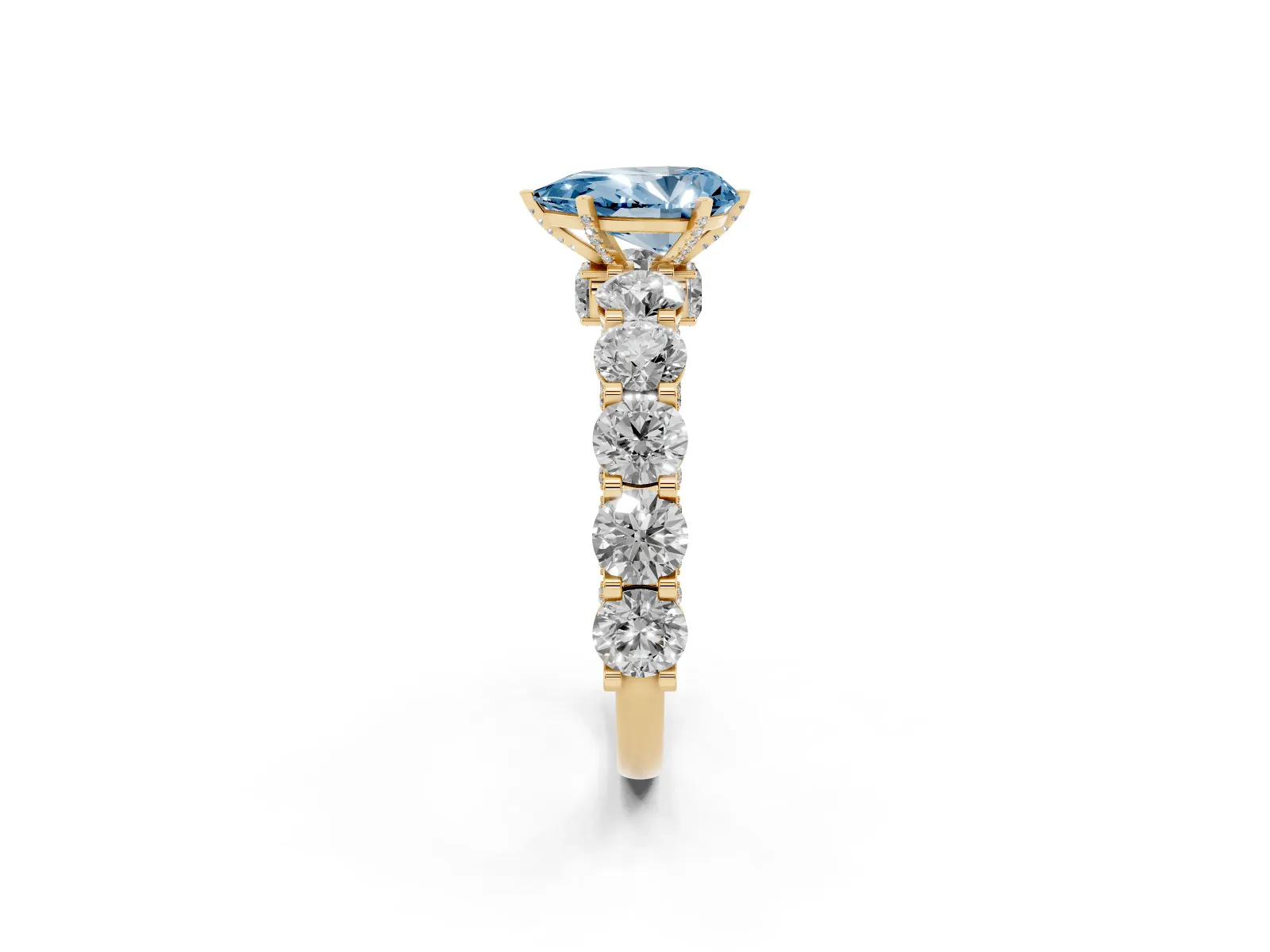 Fancy Blue Pear Cut Diamond Side Stone Engagement Ring with Four-Prong Setting Yellow gold