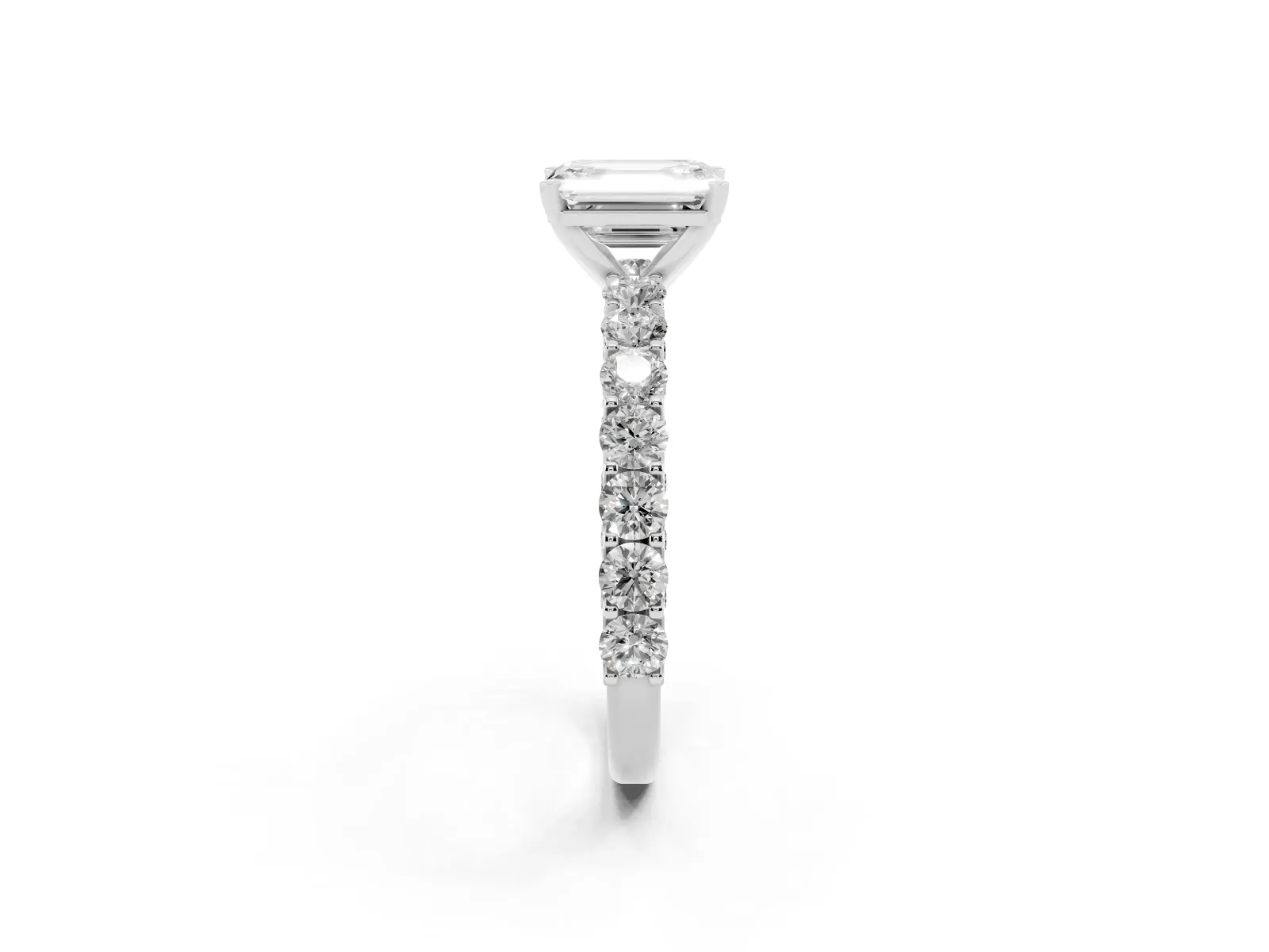 Emerald Cut Diamond Solitaire Ring with Shared Prong Pavé Band and Four-Prong Setting White gold