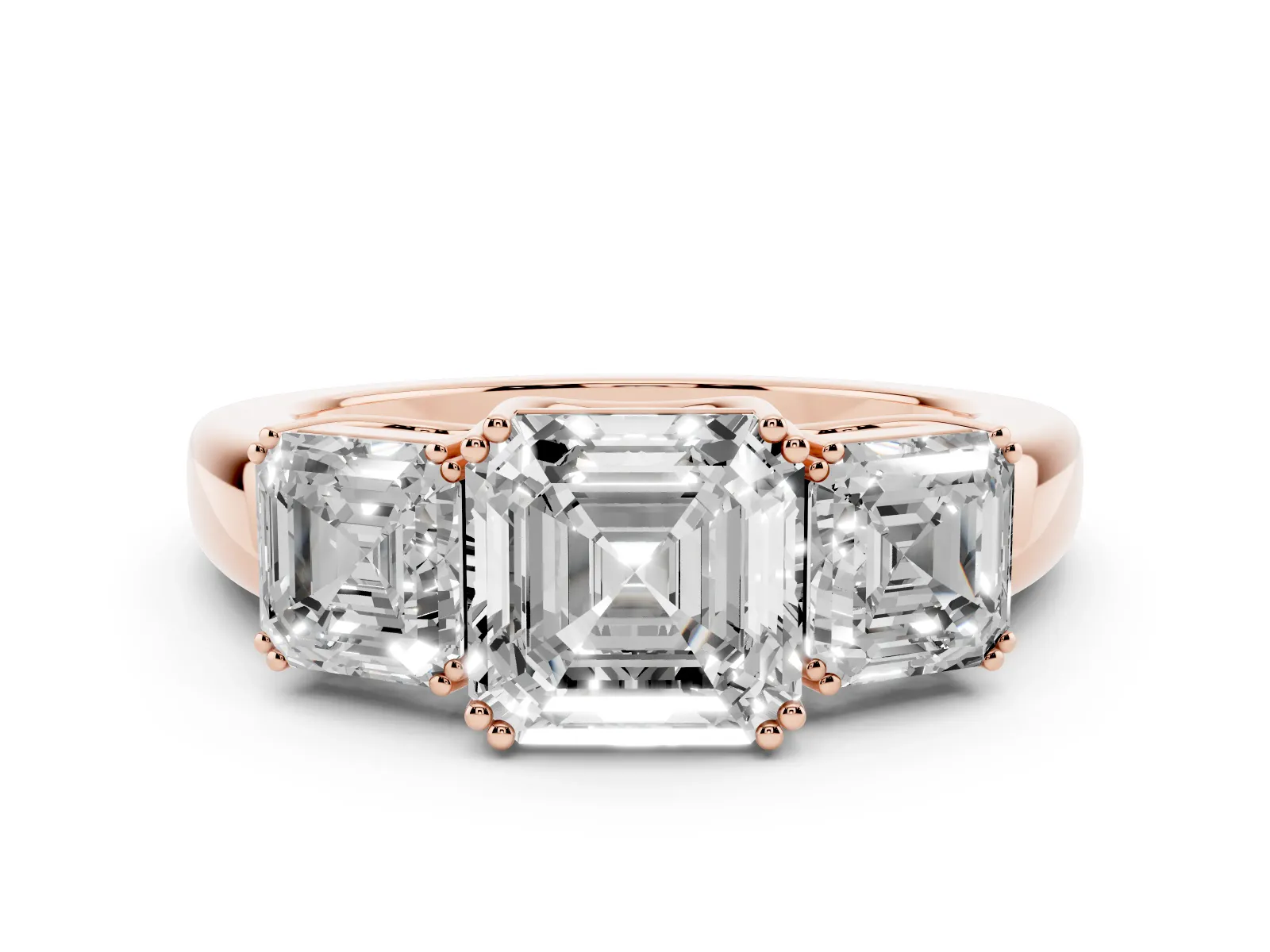 Three-Stone Asscher Cut Cut Diamond Ring with Channel Set Band and Four-Prong Setting Rose gold