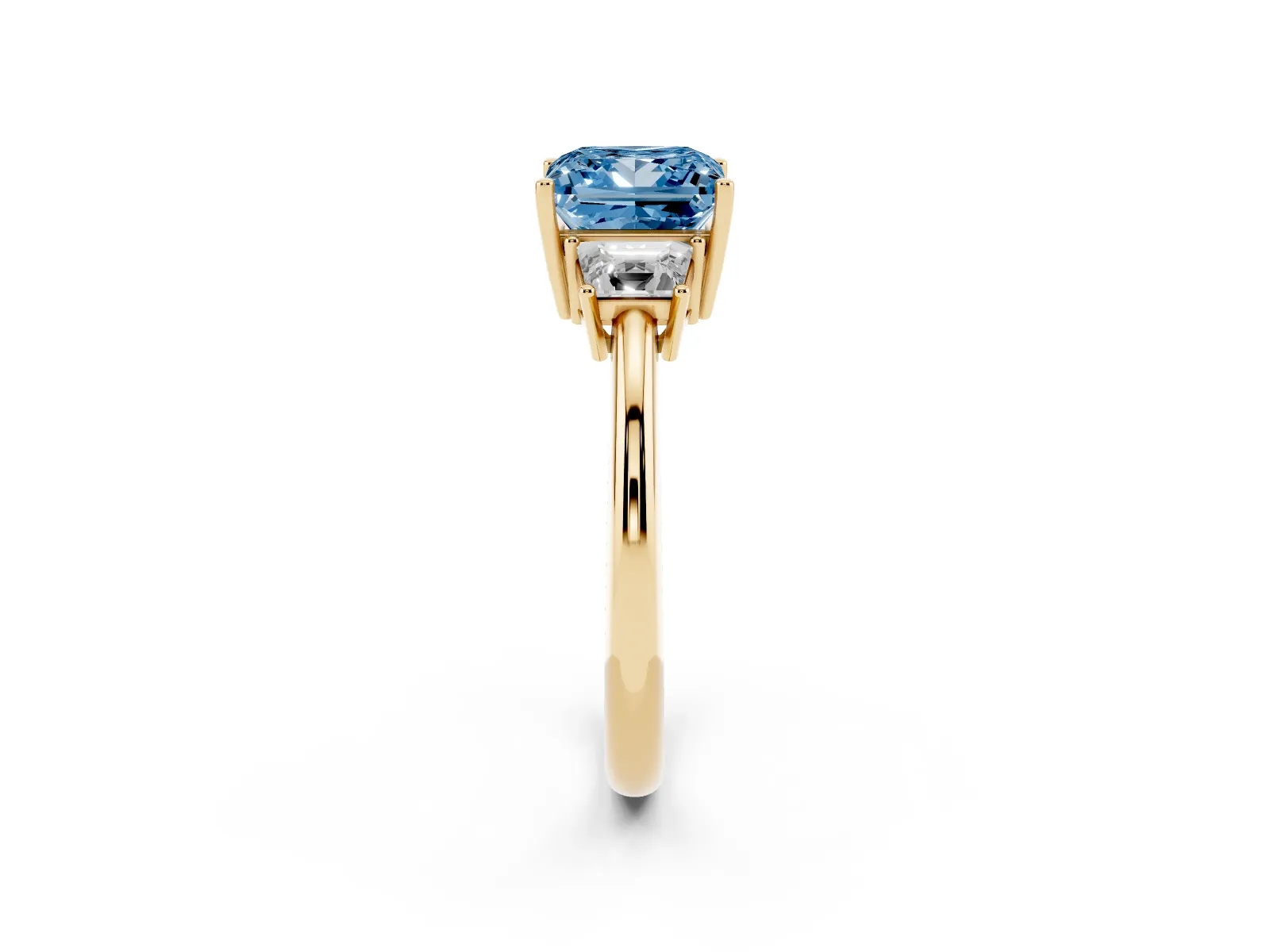 Fancy Blue Princess Cut Diamond Three-Stone Ring with Trapezoid Side Stones and Prong Setting Yellow gold