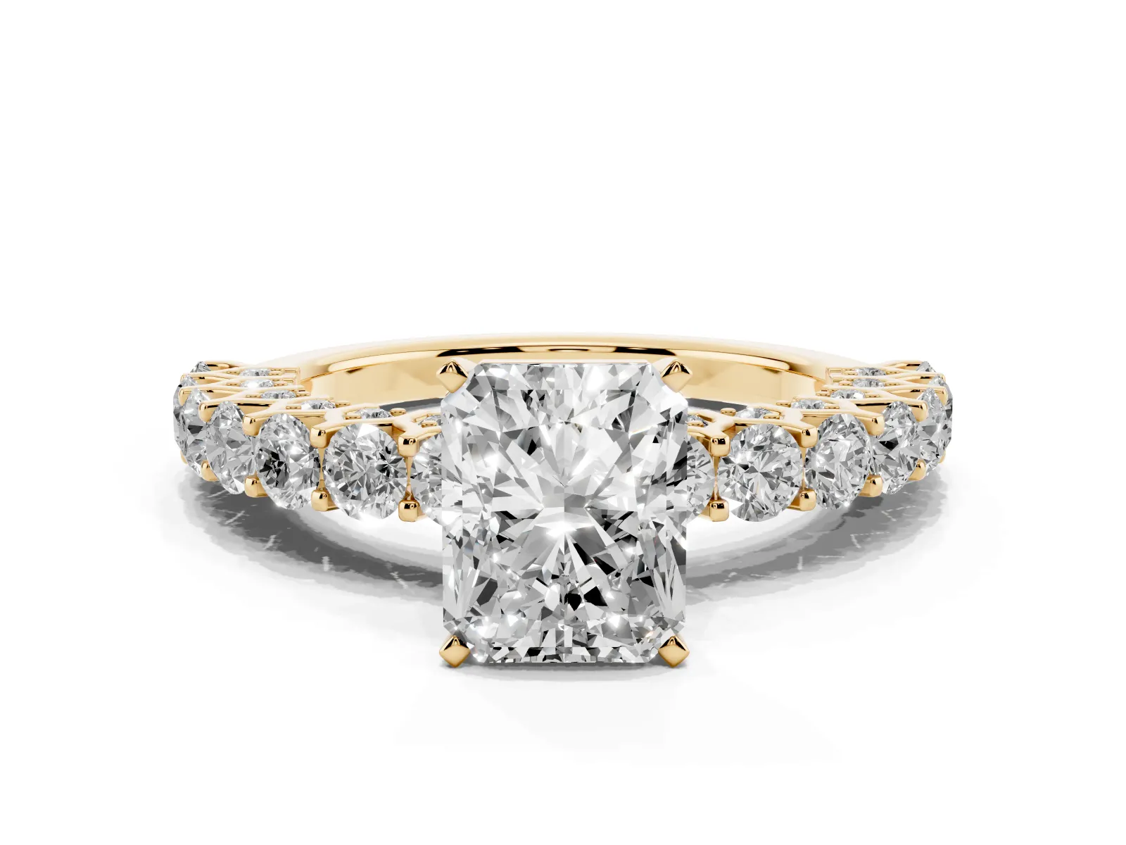 Radiant Cut Diamond Solitaire Ring with Shared Prong Pavé Band and Four-Prong Setting Yellow gold