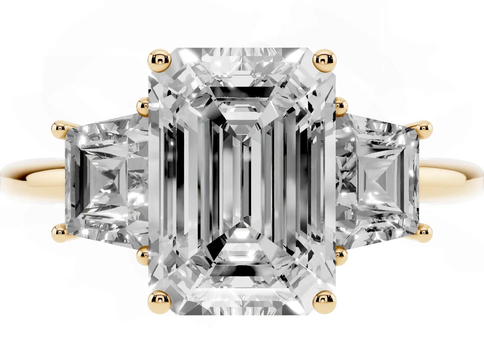 Emerald Cut Diamond Three-Stone Ring with Trapezoid Side Stones and Prong Setting Yellow gold