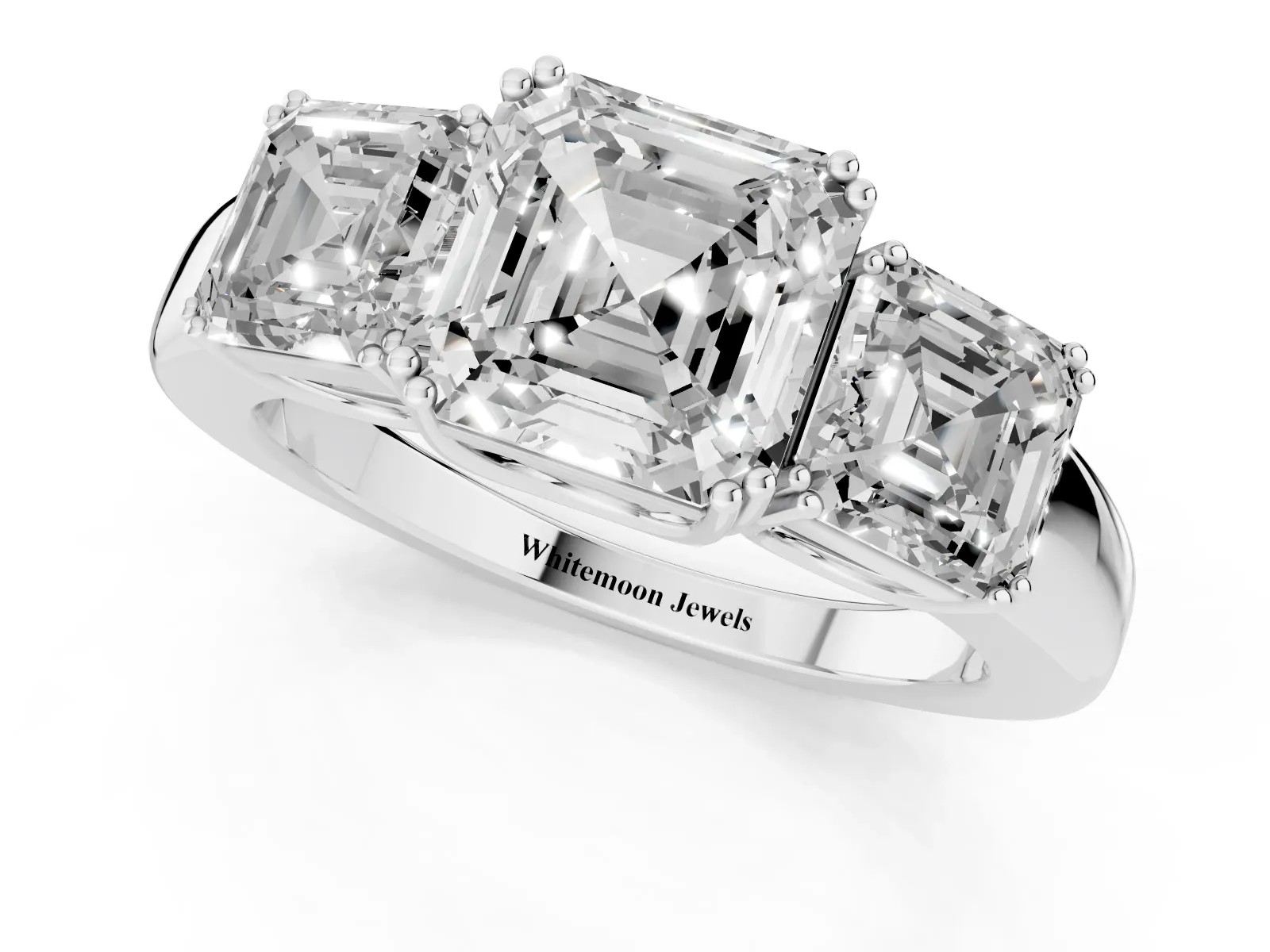Three-Stone Asscher Cut Cut Diamond Ring with Channel Set Band and Four-Prong Setting White gold