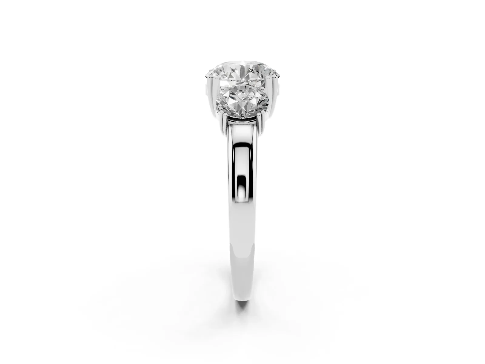 Three-Stone Round Cut Cut Diamond Ring with Channel Set Band and Four-Prong Setting White gold