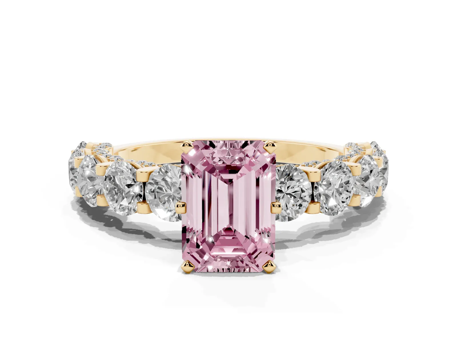 Fancy Pink Emerald Cut Diamond Side Stone Engagement Ring with Four-Prong Setting Yellow gold