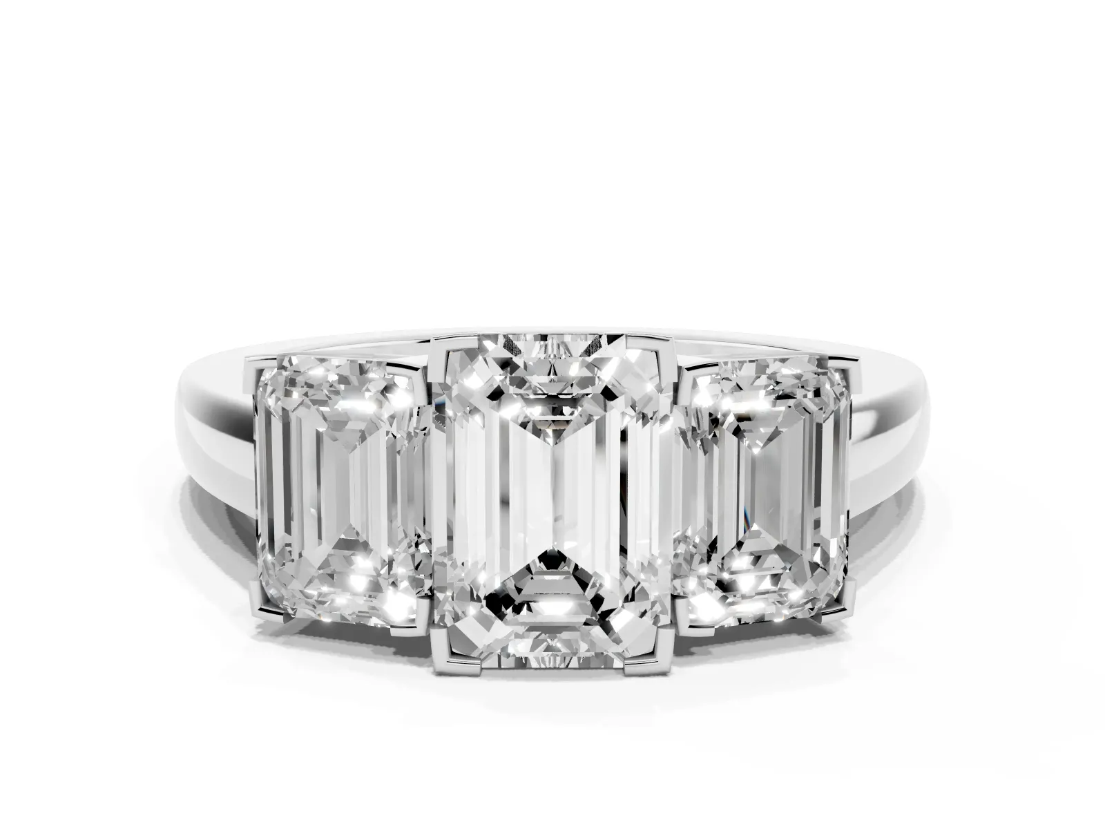 Three-Stone Emerald Cut Cut Diamond Ring with Channel Set Band and Four-Prong Setting Platinum