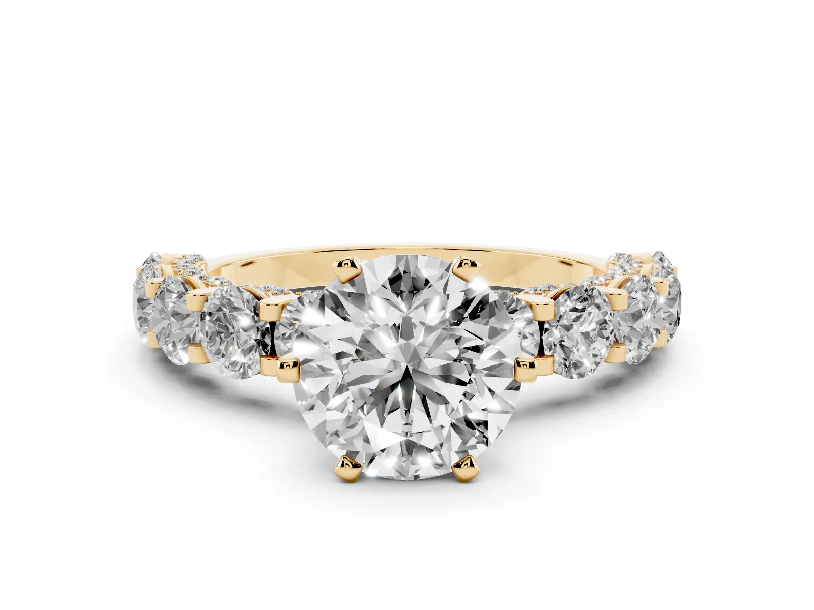 Round Cut Diamond Side Stone Engagement Ring with Four-Prong Setting Yellow gold
