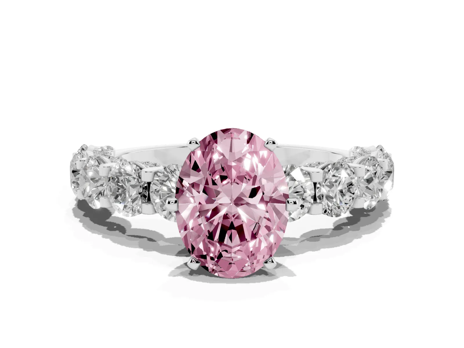 Fancy Pink Oval Cut Diamond Side Stone Engagement Ring with Four-Prong Setting Platinum
