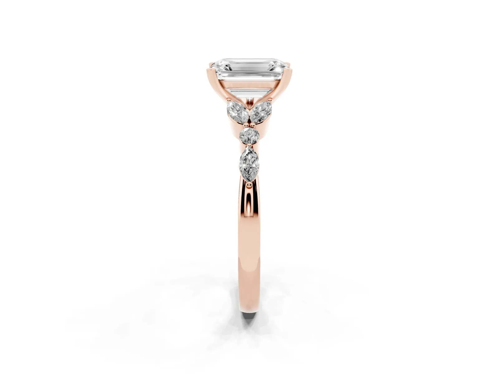 Emerald Cut Diamond Solitaire Ring with Side Stones and Four-Prong Setting Rose gold