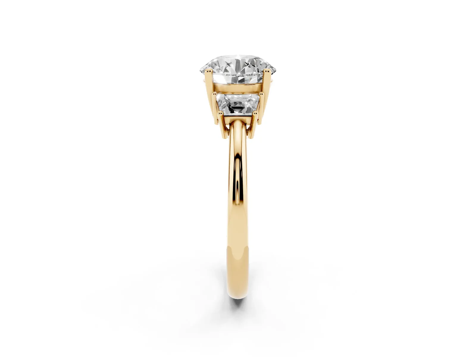 Round Cut Diamond Three-Stone Ring with Trapezoid Side Stones and Prong Setting Yellow gold