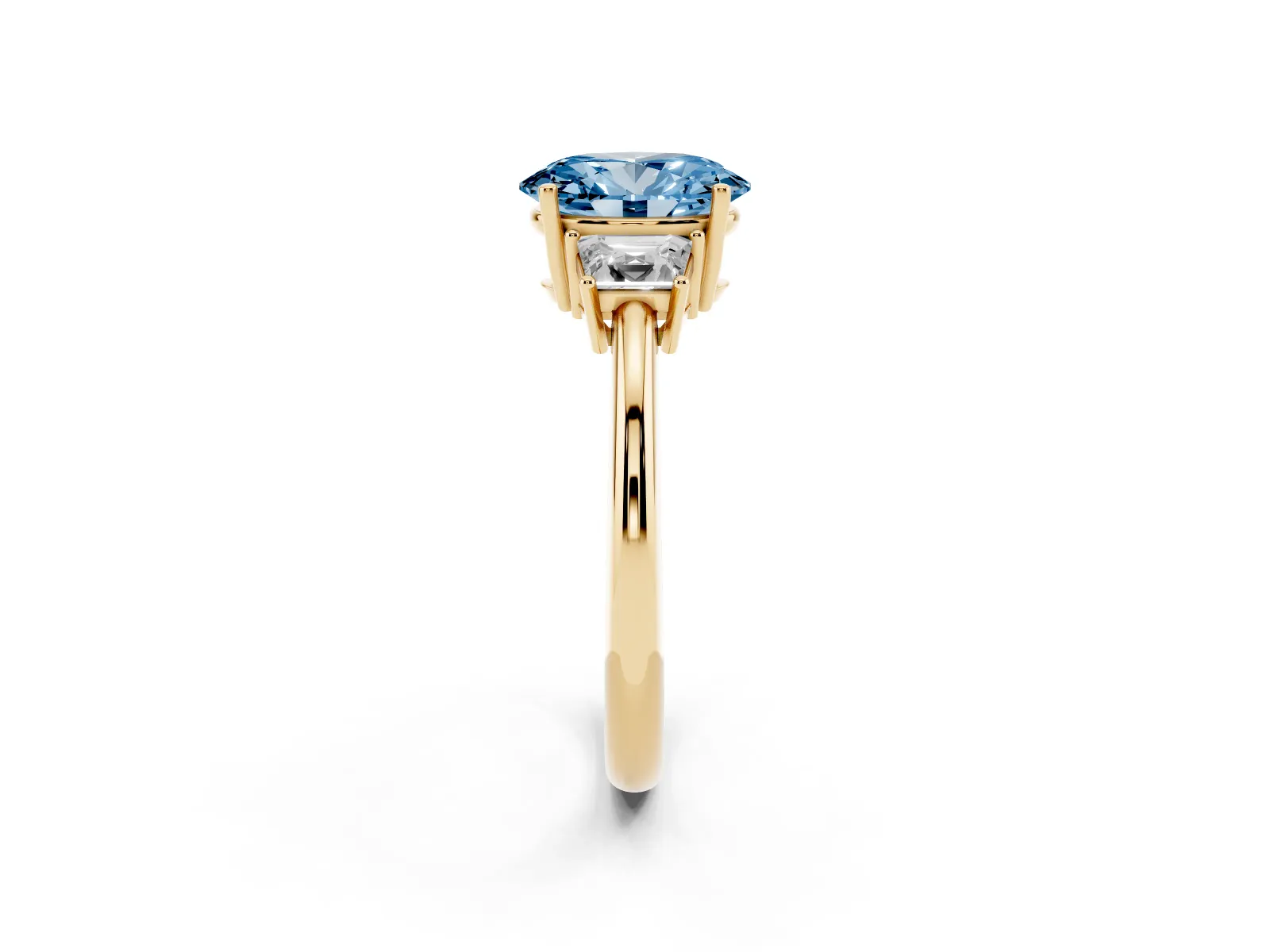 Fancy Blue Oval Cut Diamond Three-Stone Ring with Trapezoid Side Stones and Prong Setting Yellow gold