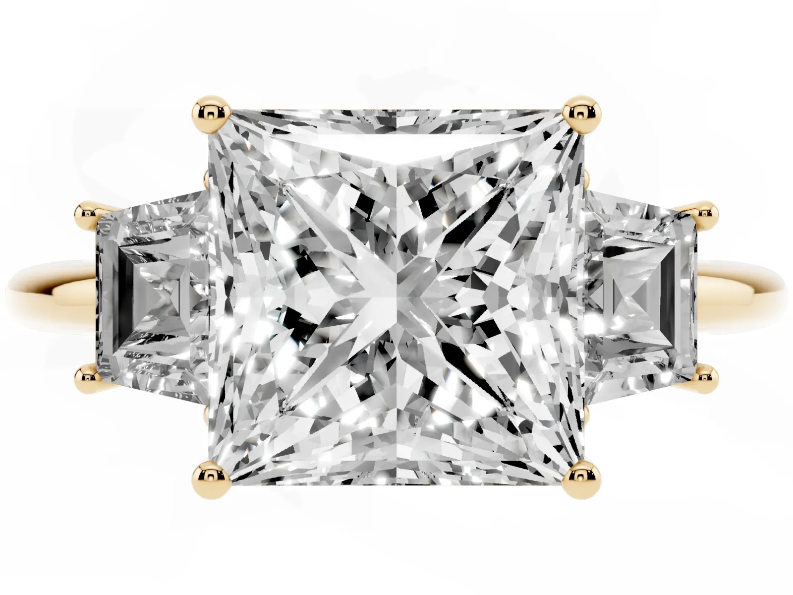 Princess Cut Diamond Three-Stone Ring with Trapezoid Side Stones and Prong Setting Yellow gold