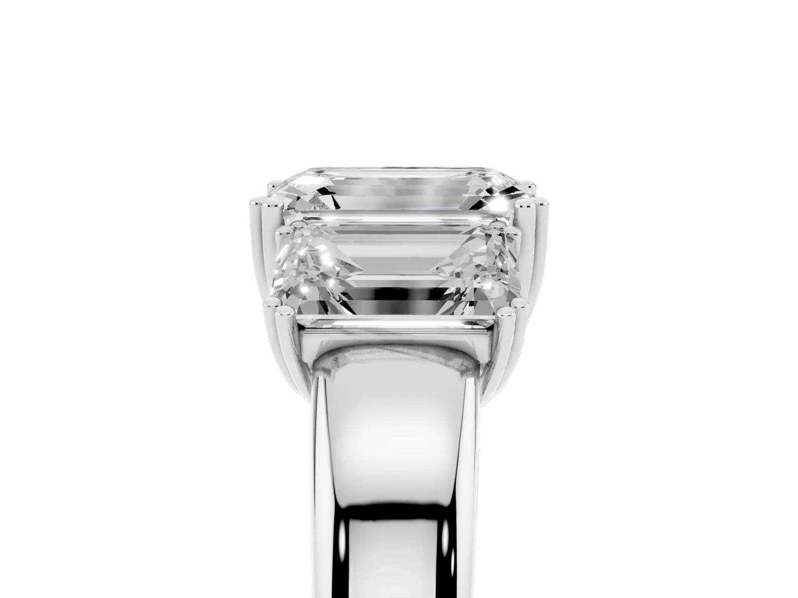 Three-Stone Emerald Cut Cut Diamond Ring with Channel Set Band and Four-Prong Setting White gold