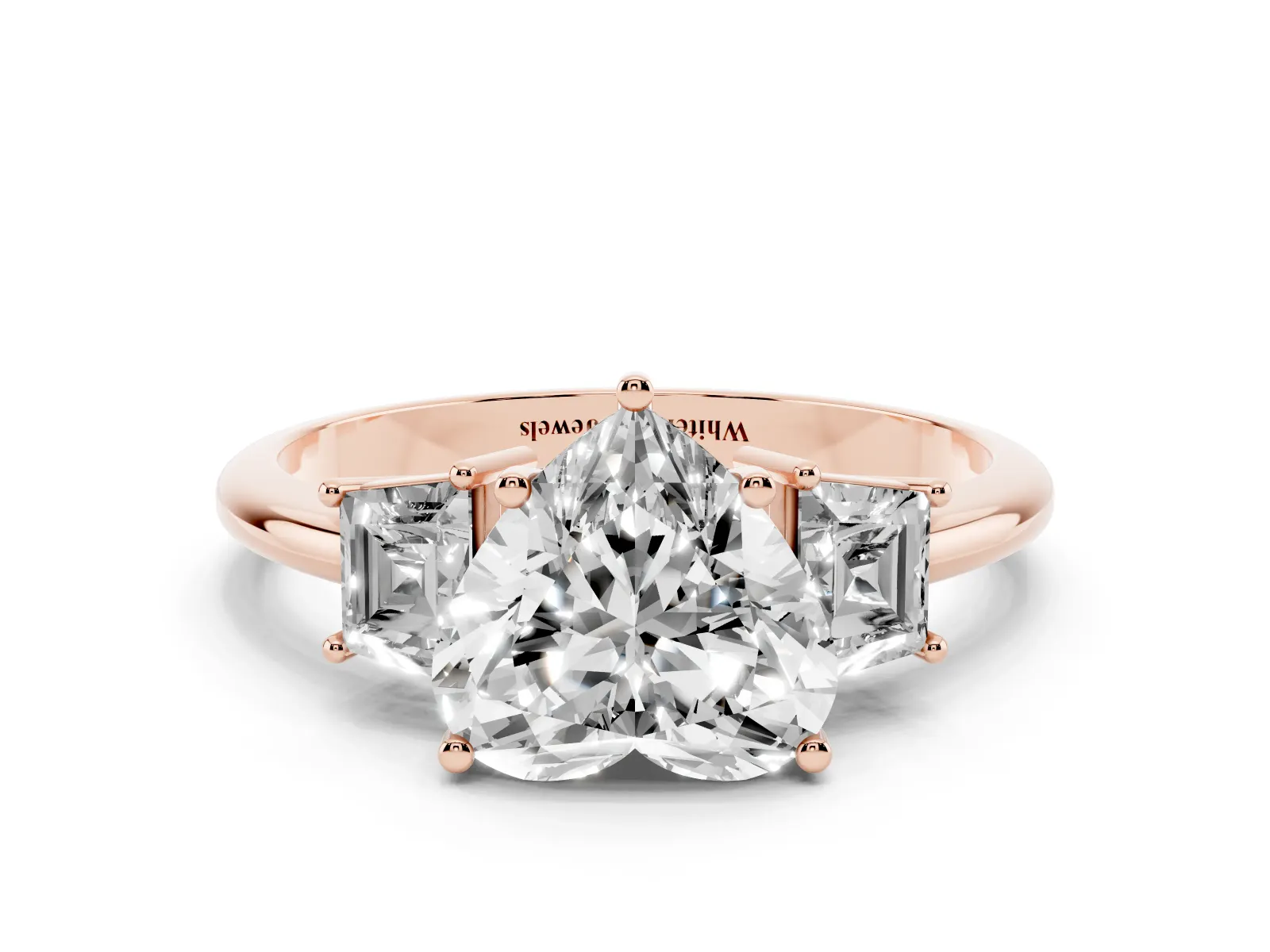 Heart Cut Diamond Three-Stone Ring with Trapezoid Side Stones and Prong Setting Rose gold