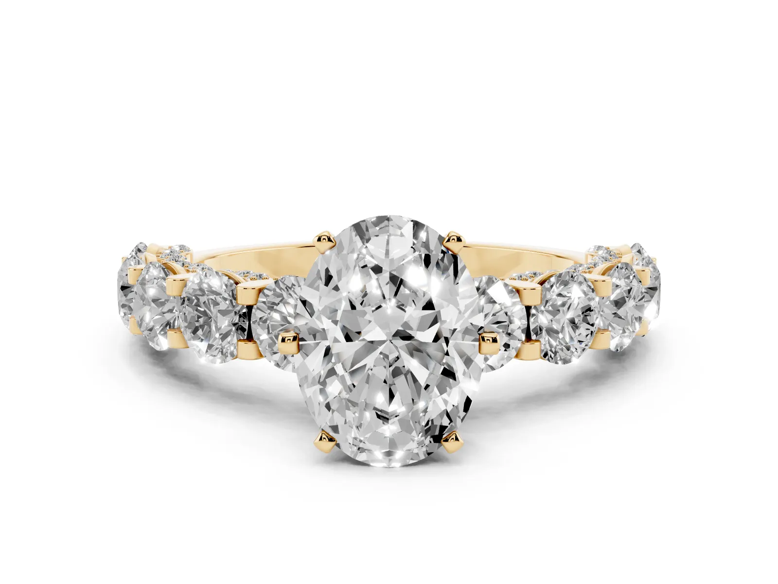 Oval Cut Diamond Side Stone Engagement Ring with Four-Prong Setting Yellow gold