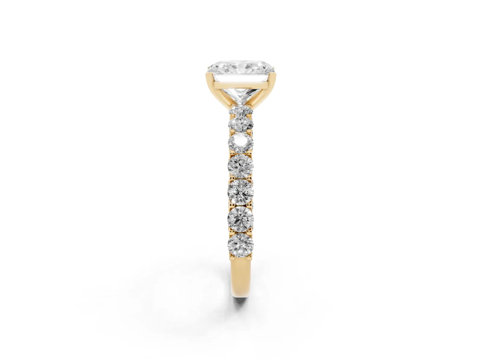 Radiant Cut Diamond Solitaire Ring with Shared Prong Pavé Band and Four-Prong Setting Yellow gold