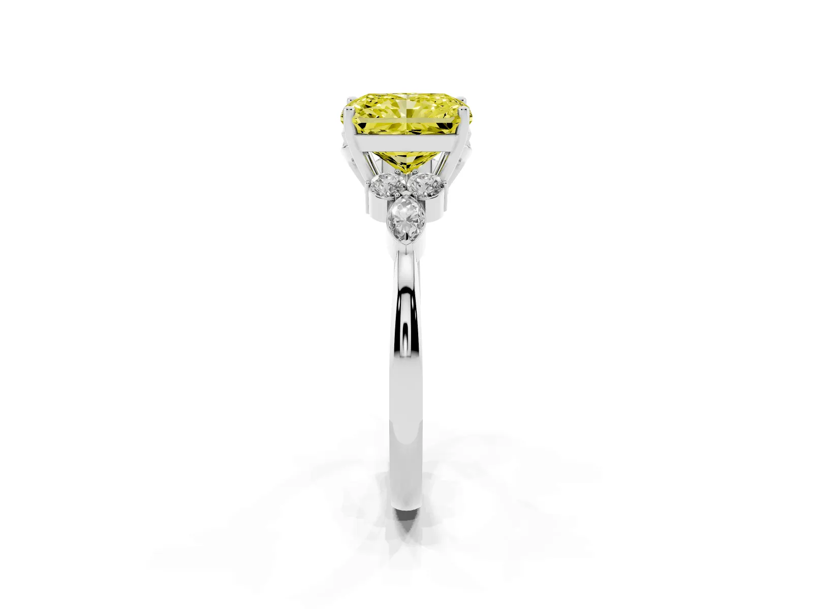 Fancy Yellow Radiant Cut Brilliant Diamond Solitaire Ring with Pear Side Stones and Four-Prong Setting White gold