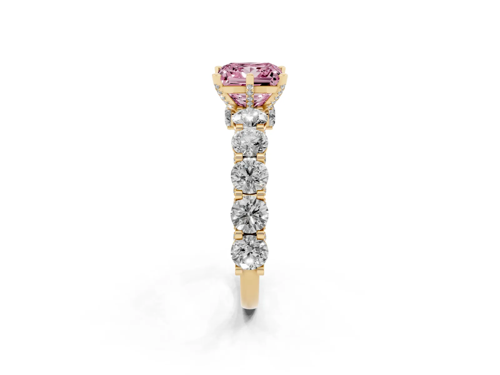Fancy Pink Princess Cut Diamond Side Stone Engagement Ring with Four-Prong Setting Yellow gold