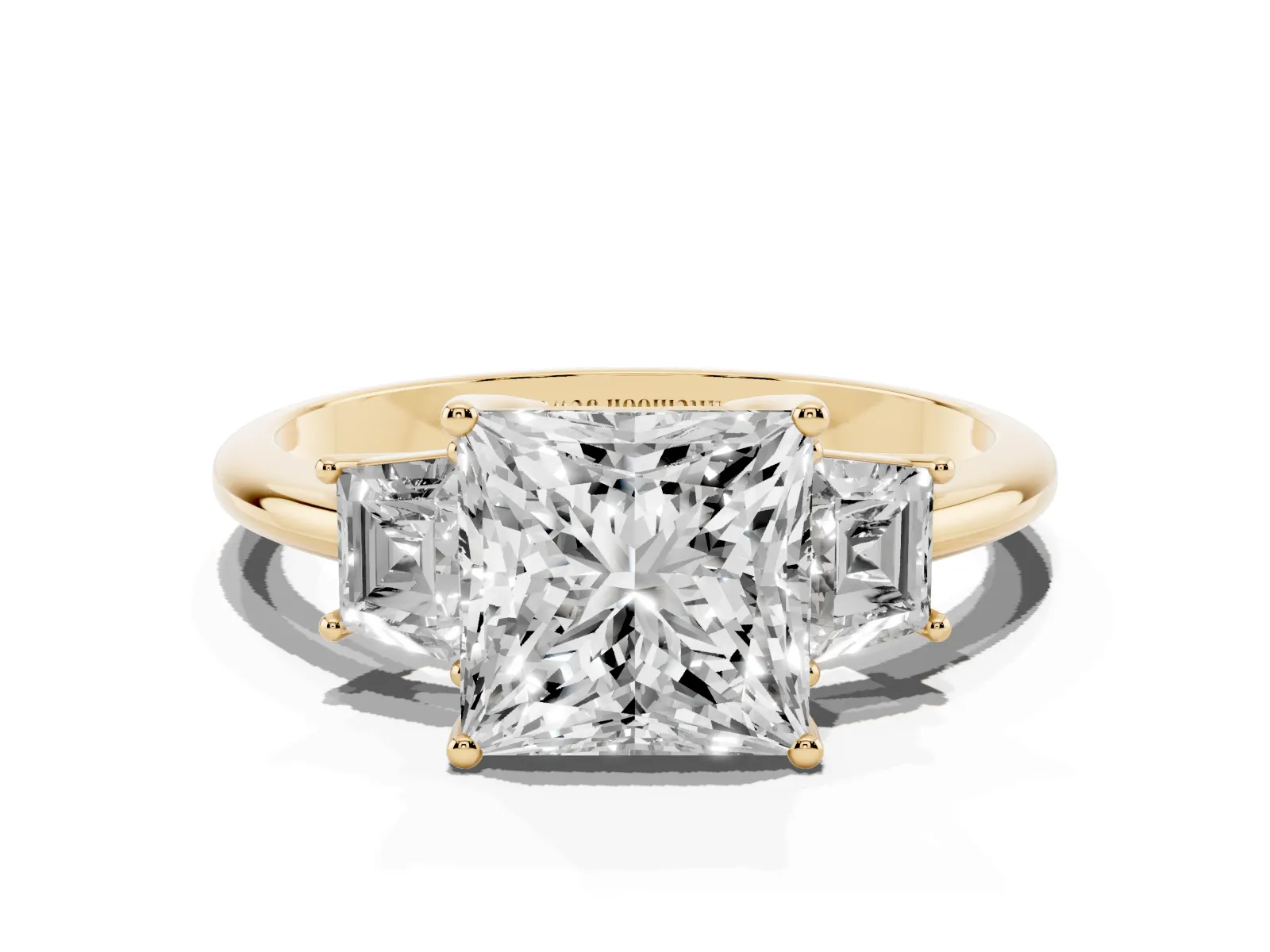 Princess Cut Diamond Three-Stone Ring with Trapezoid Side Stones and Prong Setting Yellow gold