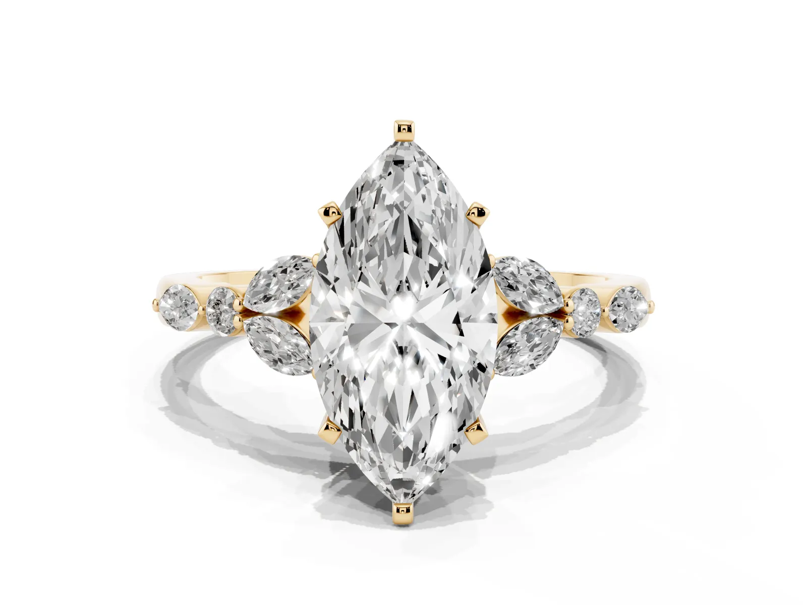 Marquise Cut Diamond Solitaire Ring with Side Stones and Four-Prong Setting Yellow gold