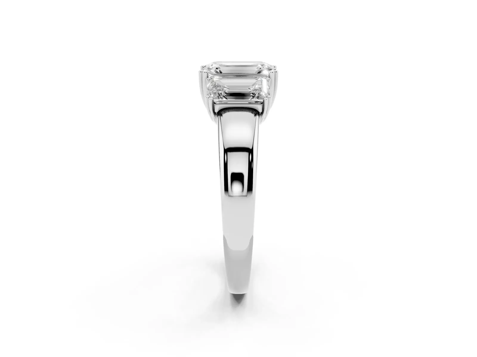 Three-Stone Emerald Cut Cut Diamond Ring with Channel Set Band and Four-Prong Setting White gold