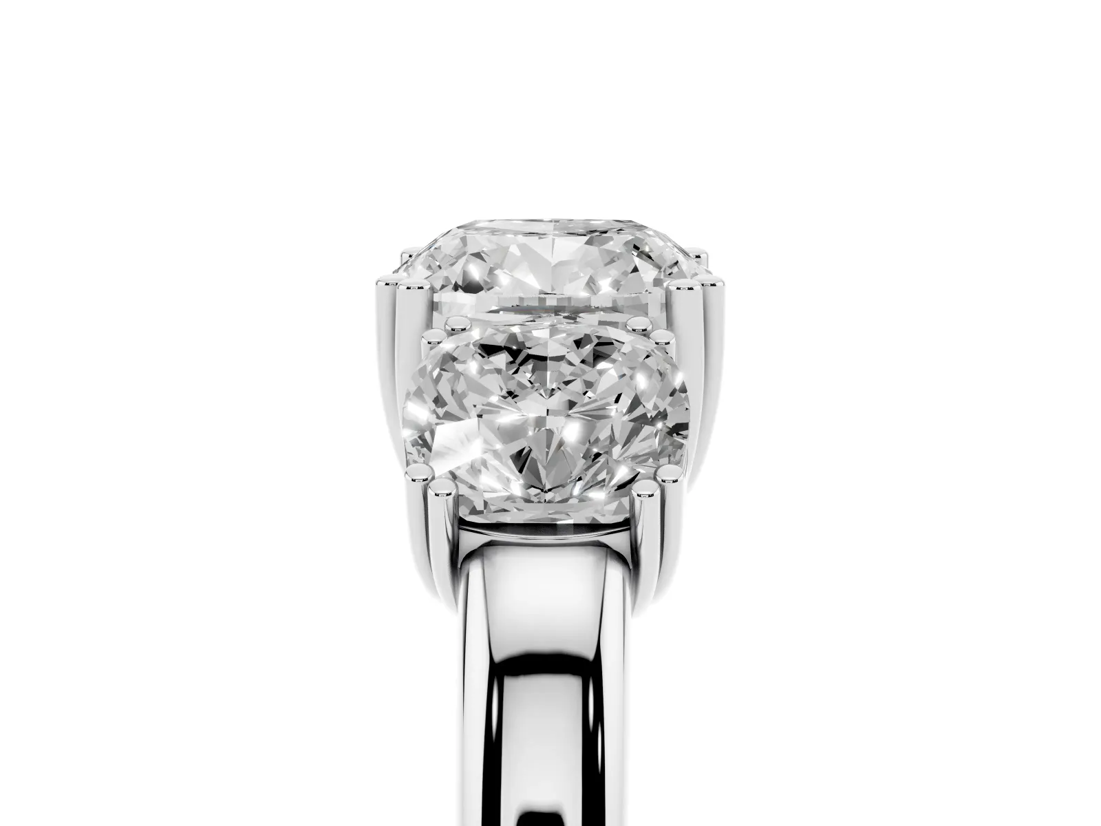 Three-Stone Cushion Cut Cut Diamond Ring with Channel Set Band and Four-Prong Setting White gold