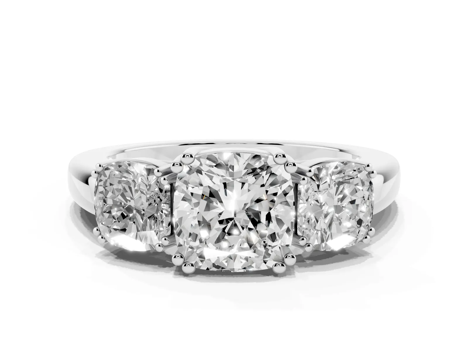 Three-Stone Cushion Cut Cut Diamond Ring with Channel Set Band and Four-Prong Setting White gold