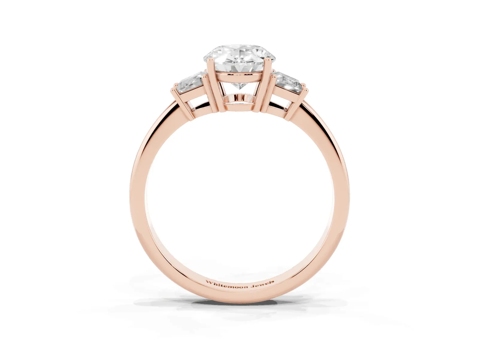 Oval Cut Diamond Three-Stone Ring with Trapezoid Side Stones and Prong Setting Rose gold