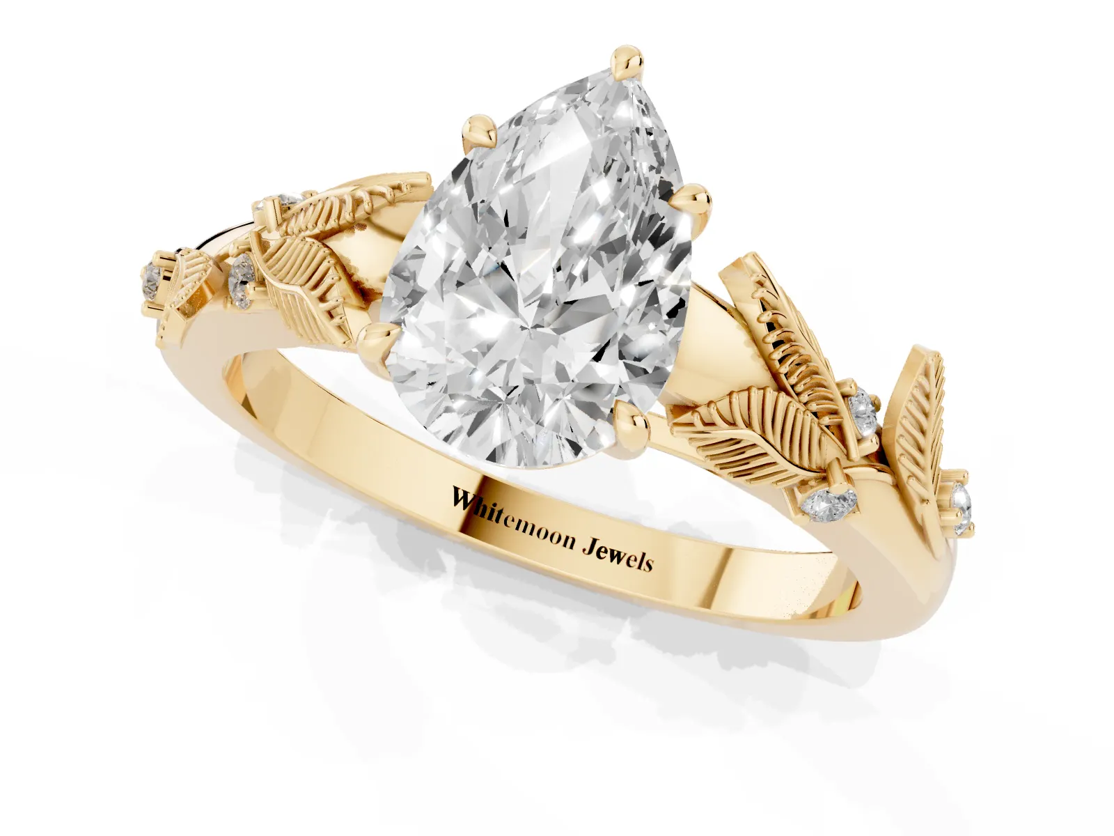 Pear Cut Diamond Solitaire Ring with Leaf Motif Band and Four-Prong Setting Yellow gold