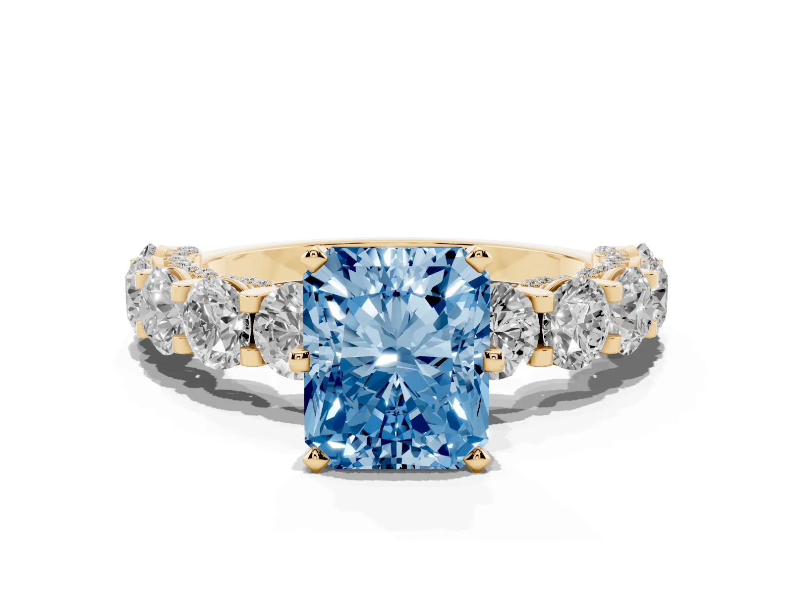 Fancy Blue Radiant Cut Diamond Side Stone Engagement Ring with Four-Prong Setting Yellow gold