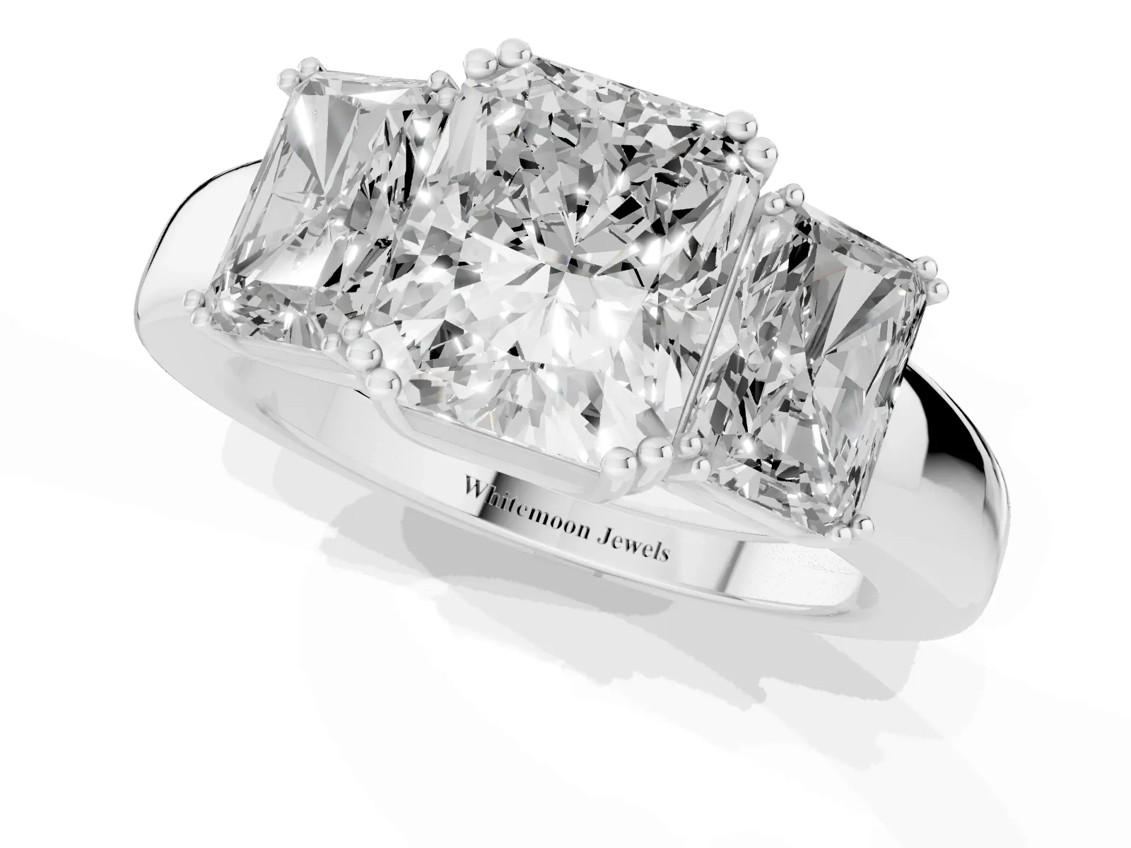 Three-Stone Radiant Cut Cut Diamond Ring with Channel Set Band and Four-Prong Setting White gold