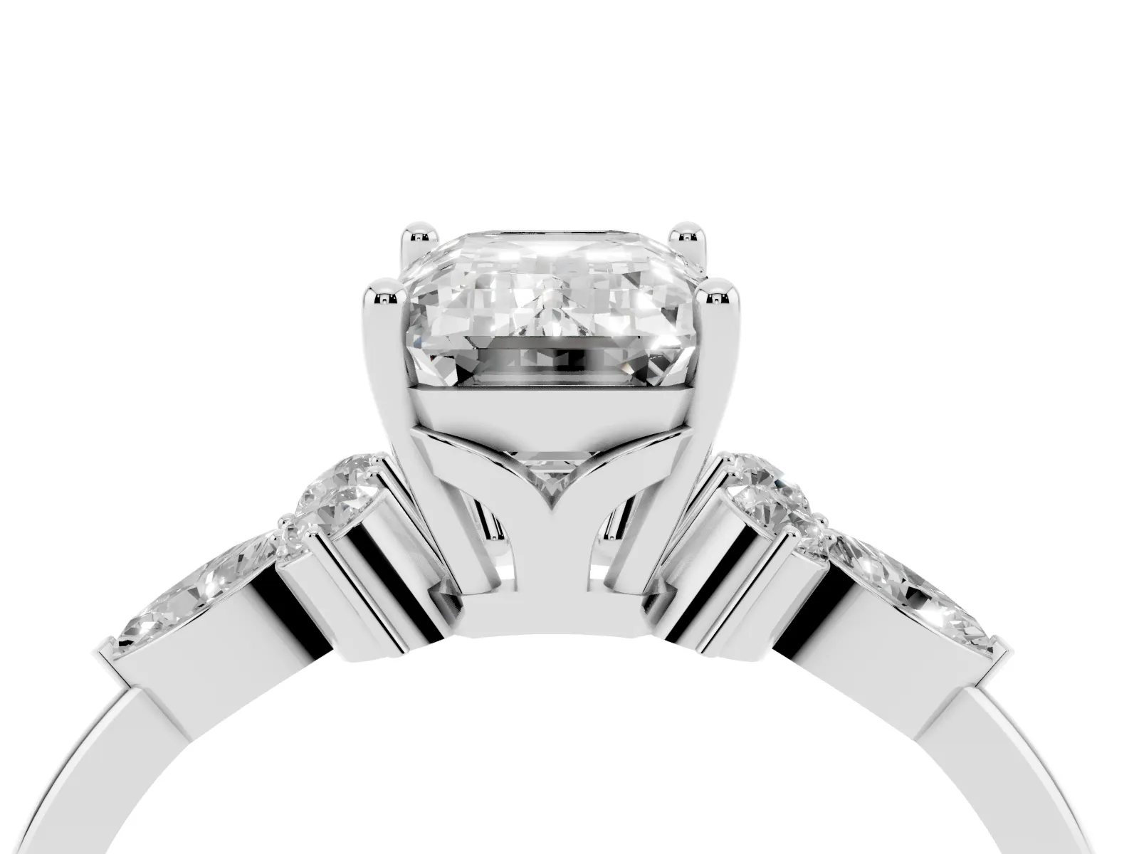 Emerald Cut Brilliant Diamond Solitaire Ring with Pear Side Stones and Four-Prong Setting Platinum