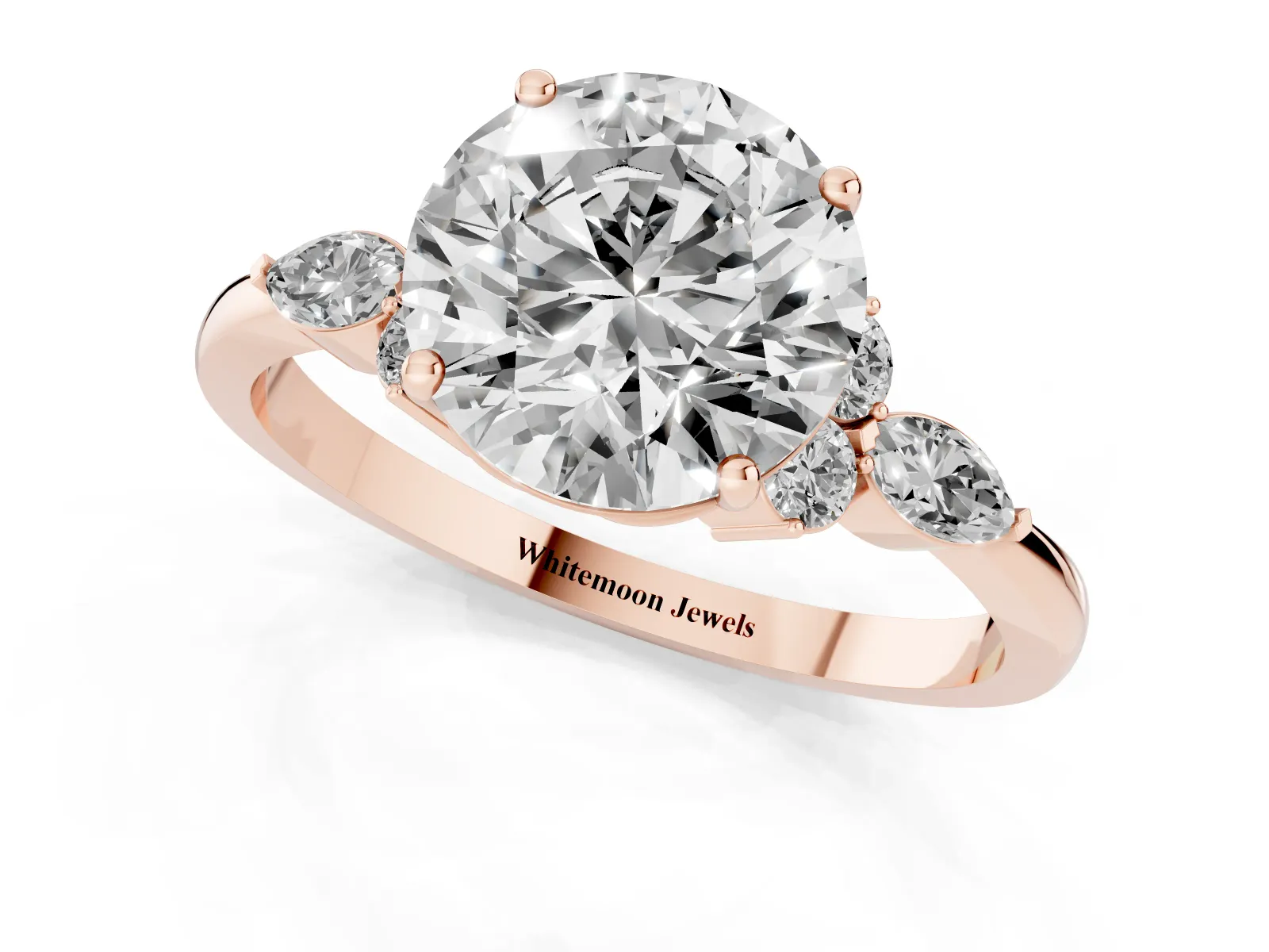 Round Cut Brilliant Diamond Solitaire Ring with Pear Side Stones and Four-Prong Setting Rose gold