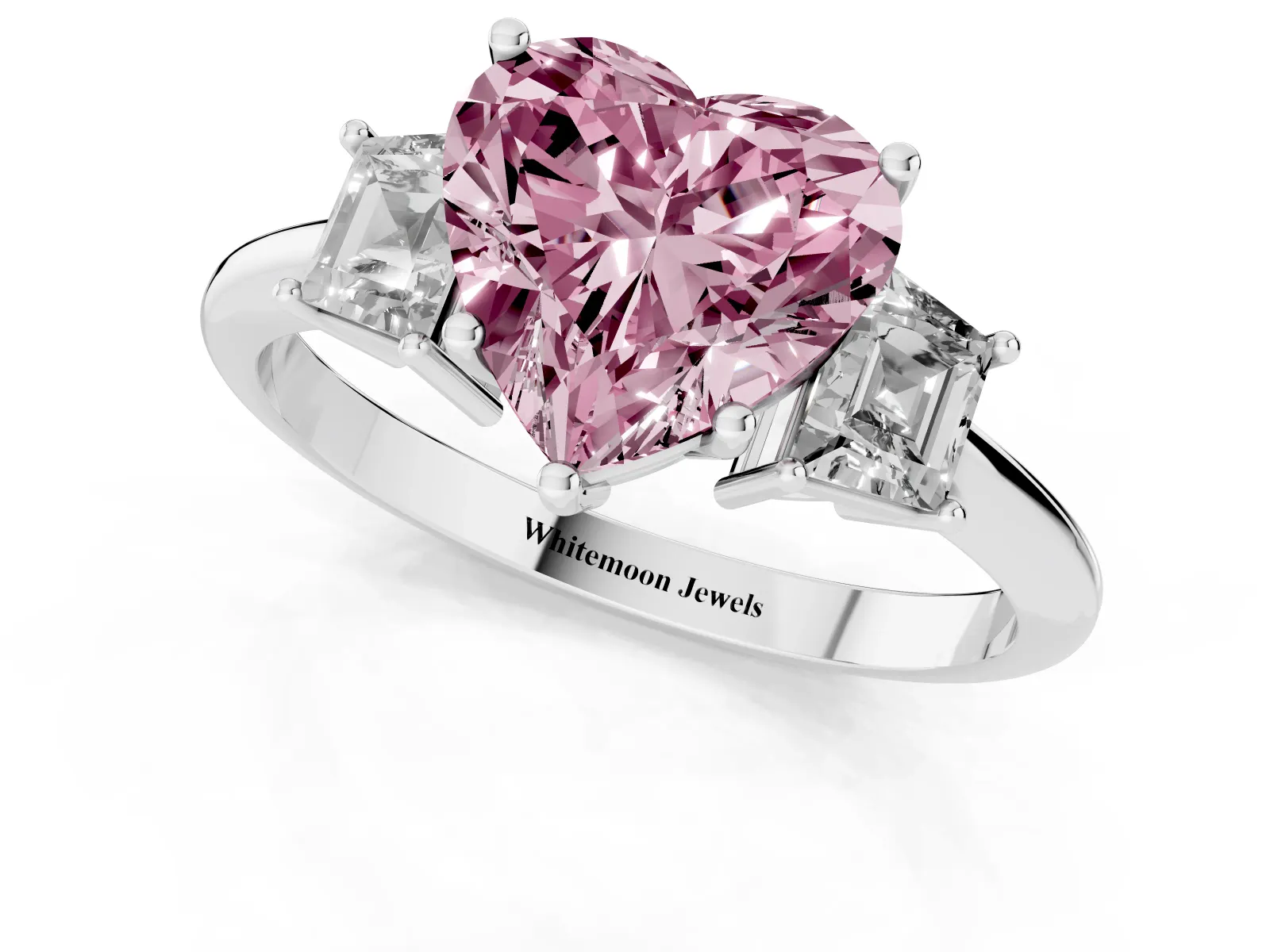 Fancy Pink Heart Cut Diamond Three-Stone Ring with Trapezoid Side Stones and Prong Setting White gold