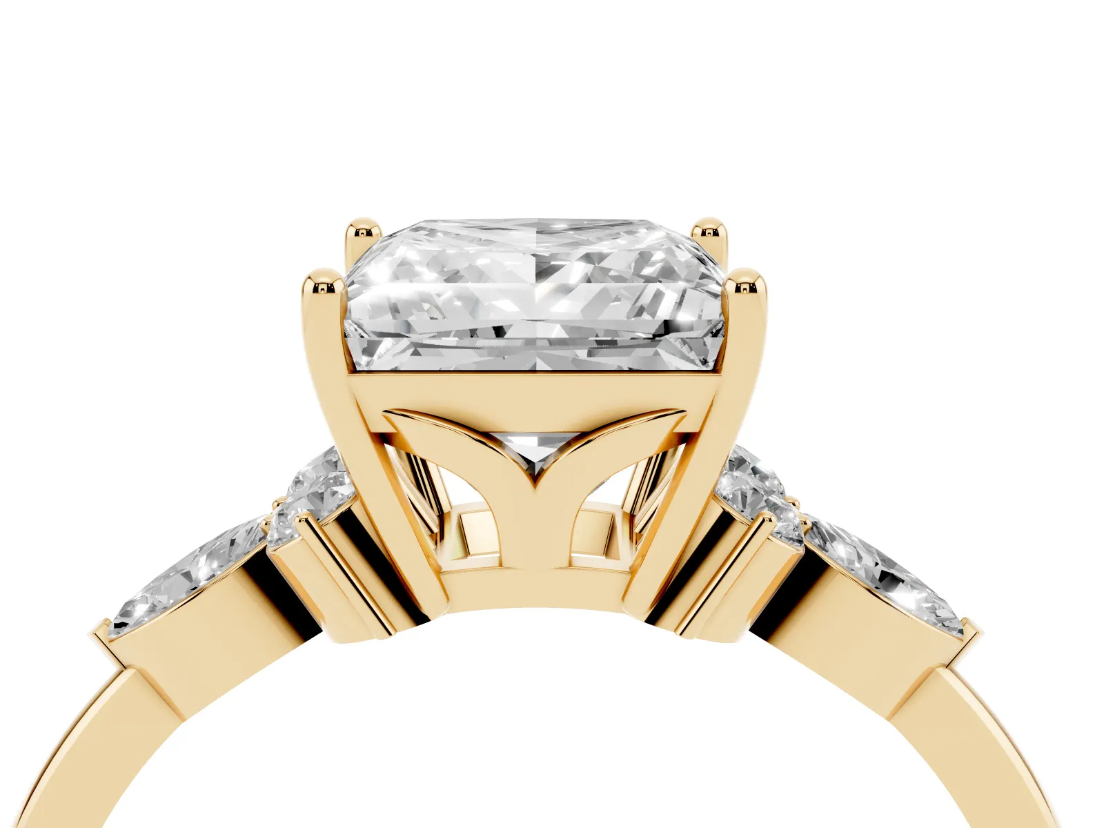 Princess Cut Brilliant Diamond Solitaire Ring with Pear Side Stones and Four-Prong Setting Yellow gold