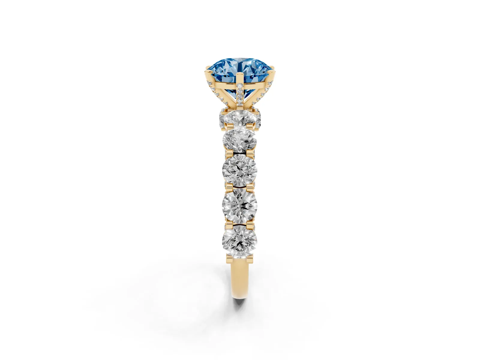Fancy Blue Round Cut Diamond Side Stone Engagement Ring with Four-Prong Setting Yellow gold