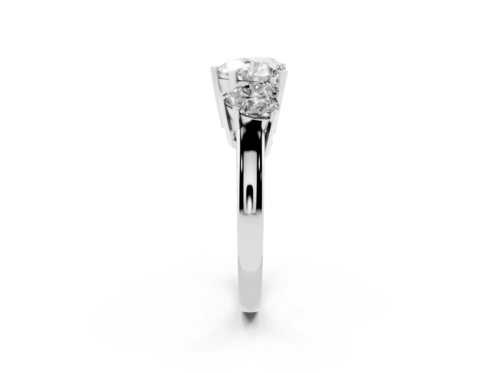 Three-Stone Heart Cut Cut Diamond Ring with Channel Set Band and Four-Prong Setting Platinum
