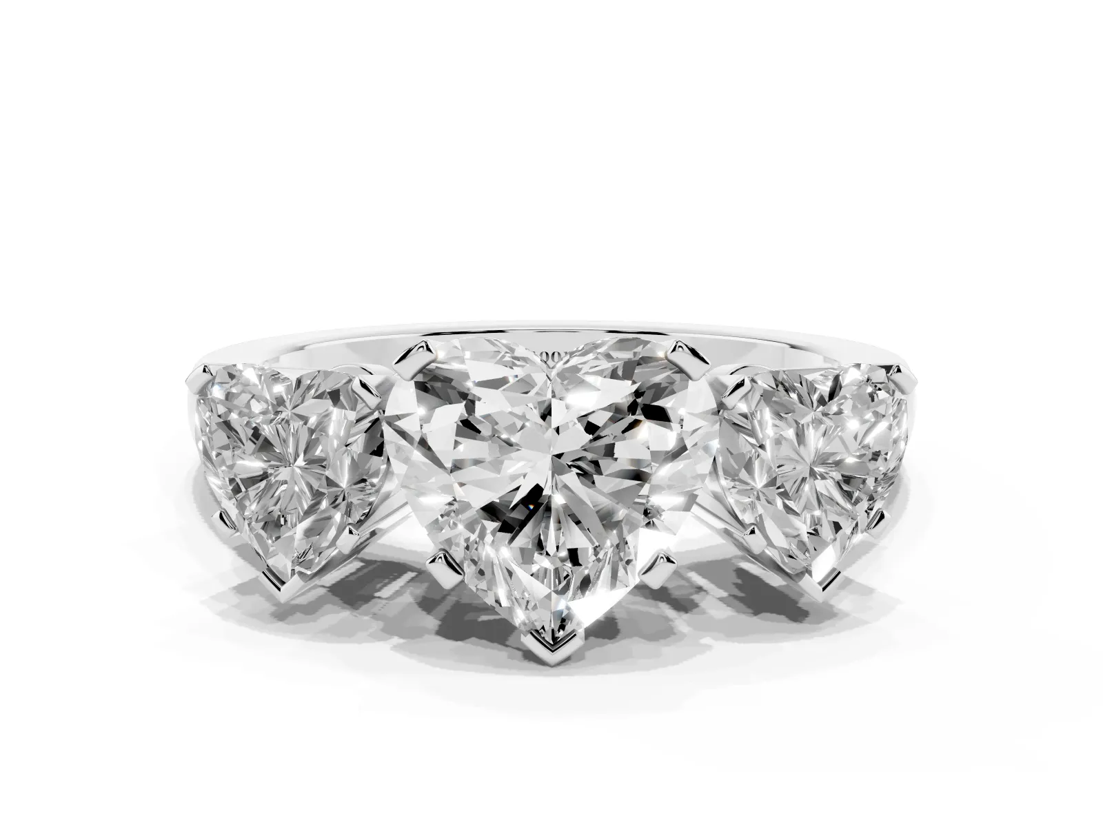 Three-Stone Heart Cut Cut Diamond Ring with Channel Set Band and Four-Prong Setting Platinum