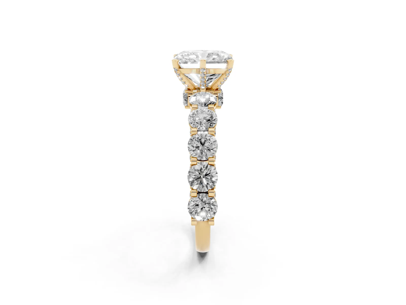 Radiant Cut Diamond Side Stone Engagement Ring with Four-Prong Setting Yellow gold