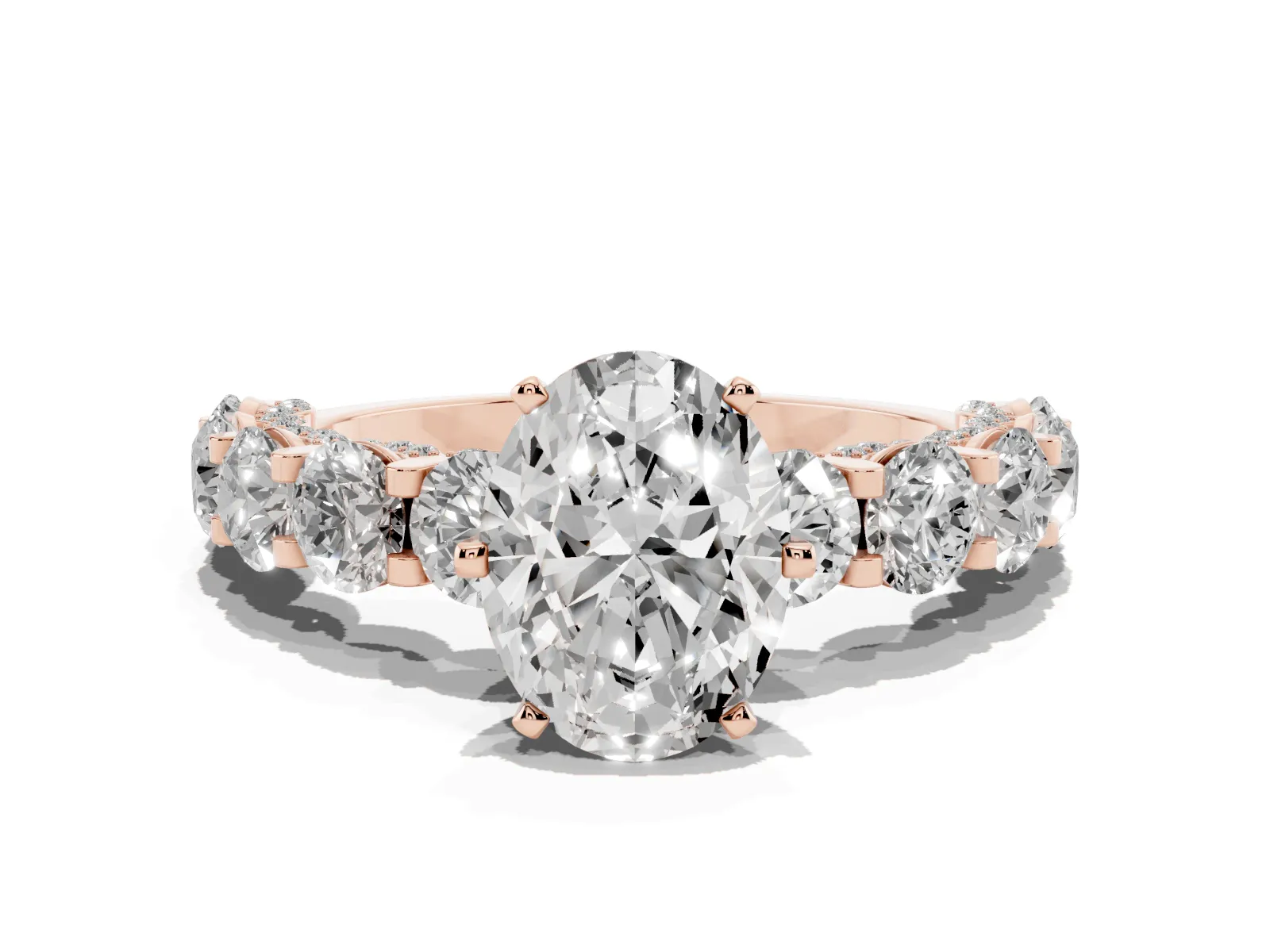 Oval Cut Diamond Side Stone Engagement Ring with Four-Prong Setting Rose gold