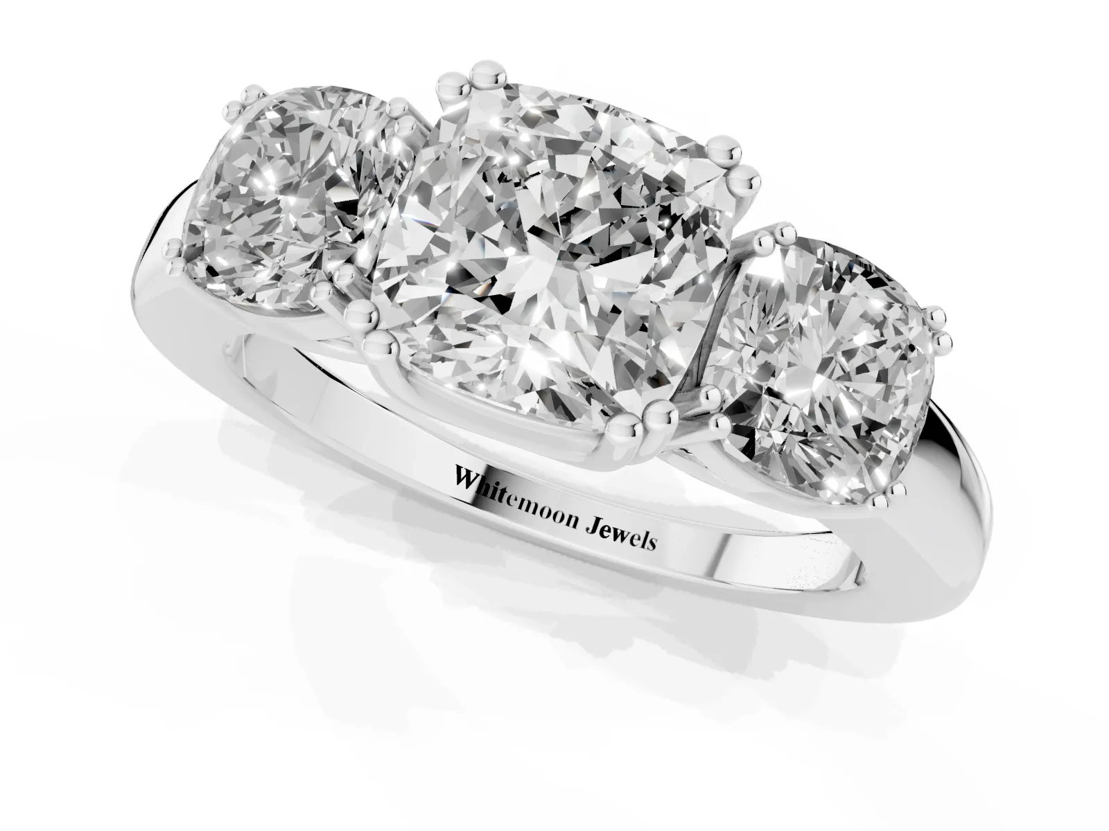 Three-Stone Cushion Cut Cut Diamond Ring with Channel Set Band and Four-Prong Setting White gold