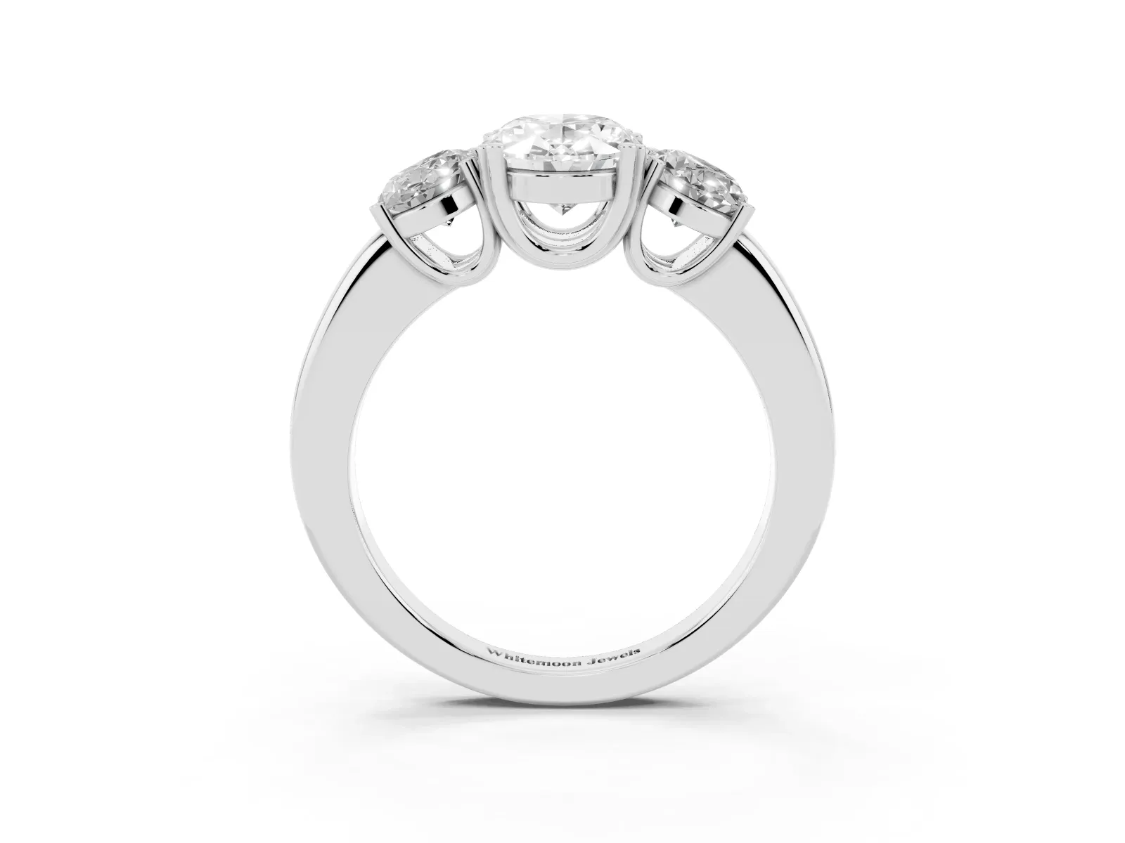 Three-Stone Oval Cut Cut Diamond Ring with Channel Set Band and Four-Prong Setting White gold