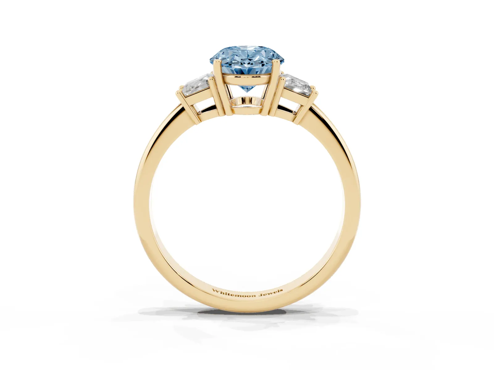 Fancy Blue Oval Cut Diamond Three-Stone Ring with Trapezoid Side Stones and Prong Setting Yellow gold