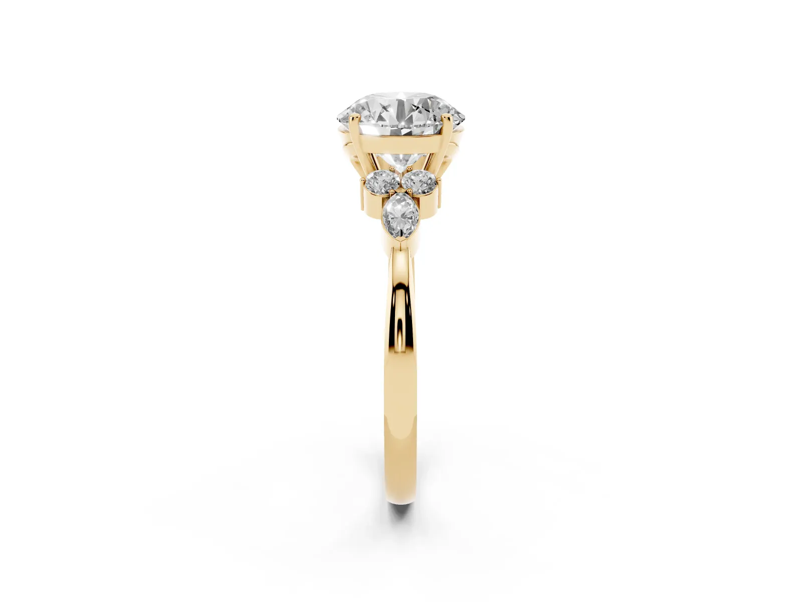 Round Cut Brilliant Diamond Solitaire Ring with Pear Side Stones and Four-Prong Setting Yellow gold