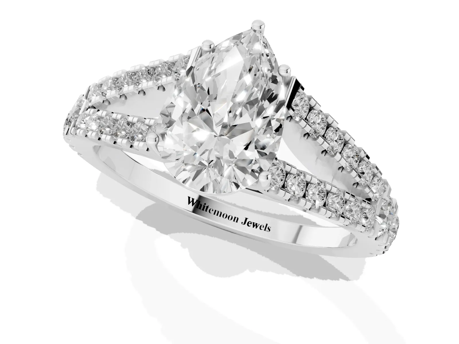 Pear Cut Diamond Split Shank Engagement Ring with Round Pavé and Prong Setting White gold