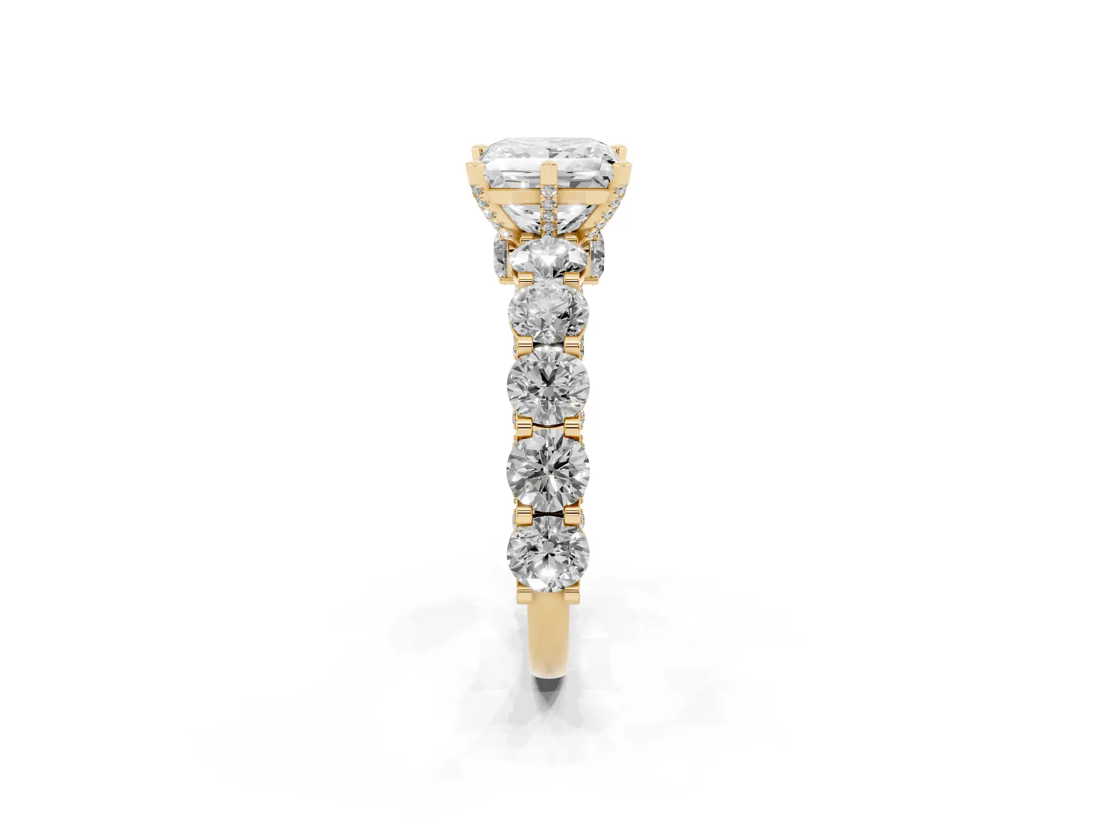 Princess Cut Diamond Side Stone Engagement Ring with Four-Prong Setting Yellow gold